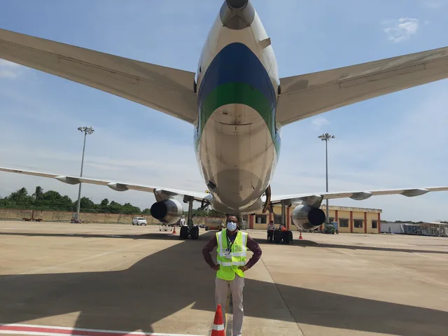An Axium valuer at an aircraft lease inspection on the tarmac