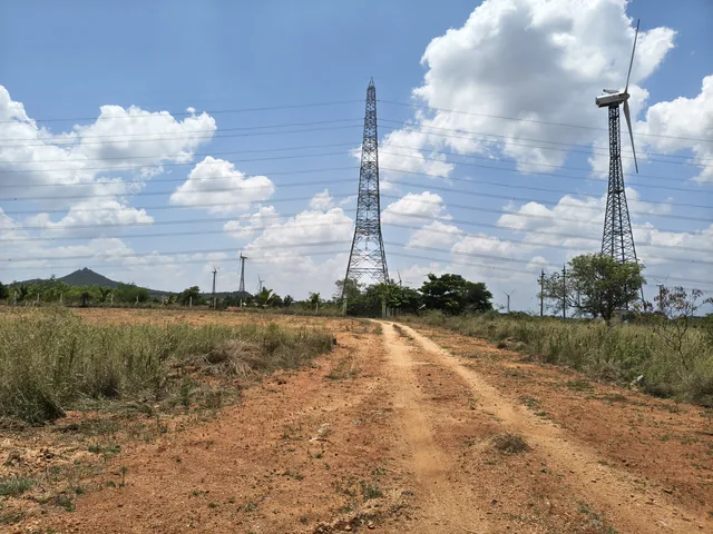 Transmission towers and wind turbines inspected as part of an infrastructure valuation