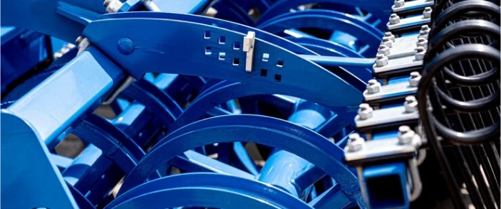Close-up of blue industrial machinery components